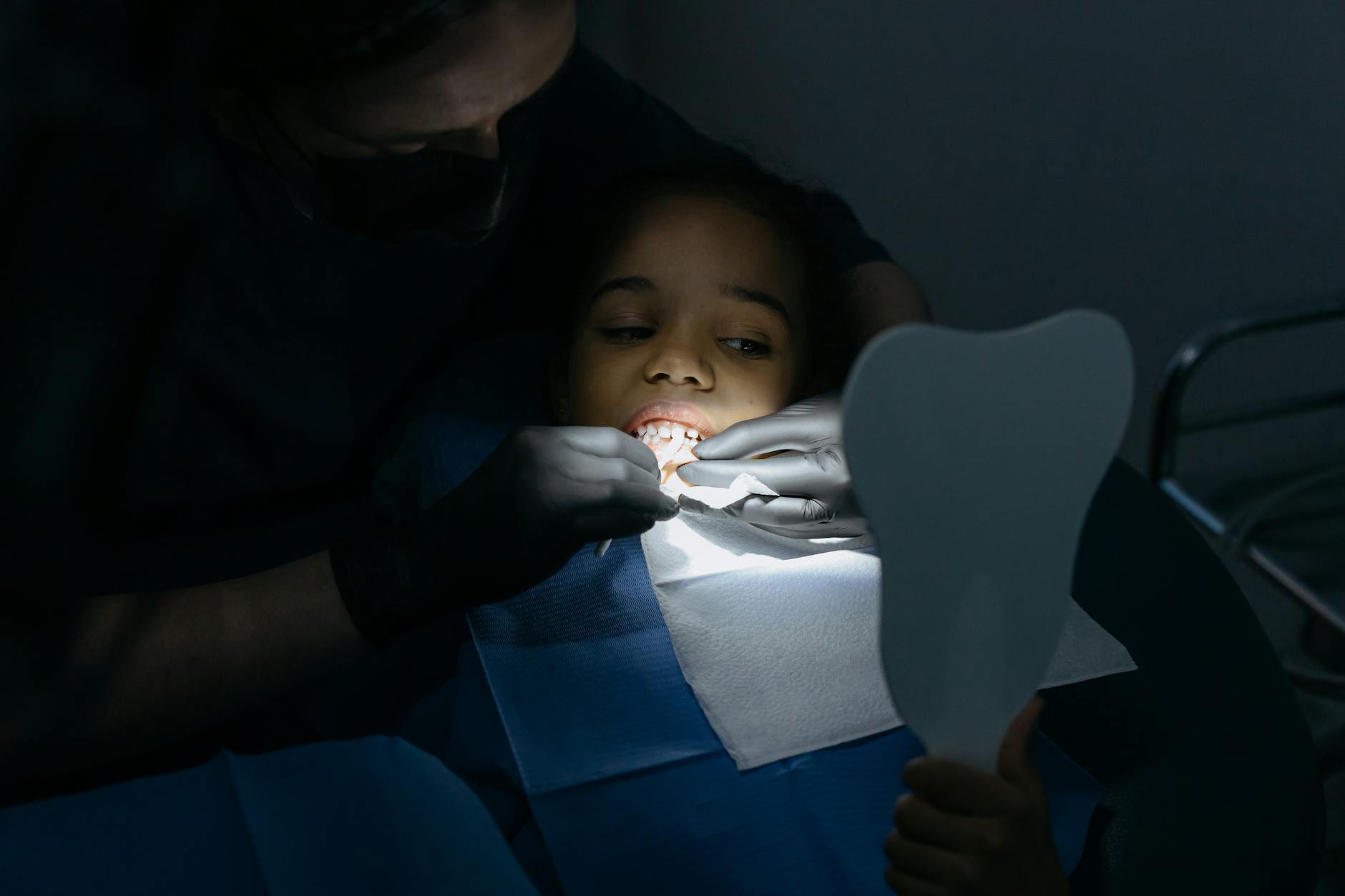 close up shot of a girl having dental checkup